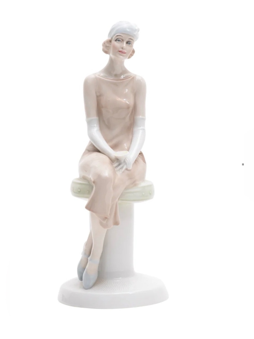Royal Doulton Porcelain Figurine of Seated Woman in Pale Pink Dress